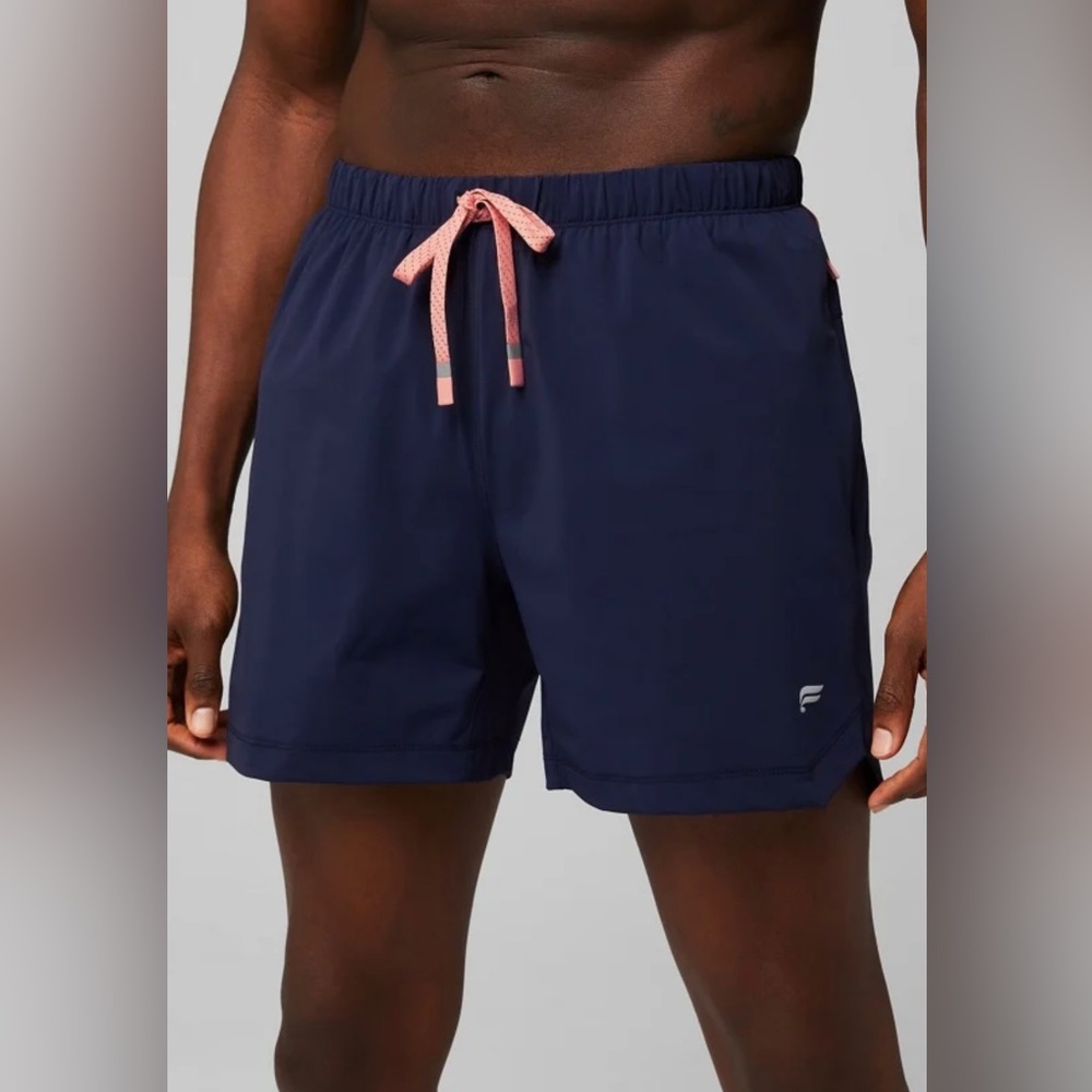 The One Short 5in- by Fabletics- train in it- swim in it. Quick dry. Men’s large